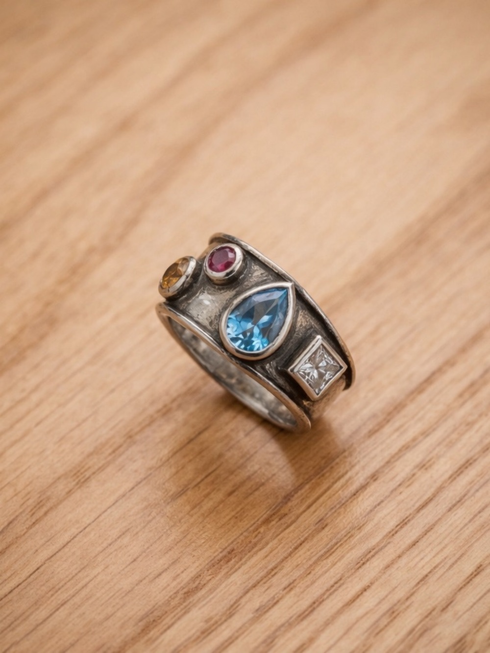 Source Unknown Silver Ring with Blue Teardrop and Multi-Colored Accent Stones